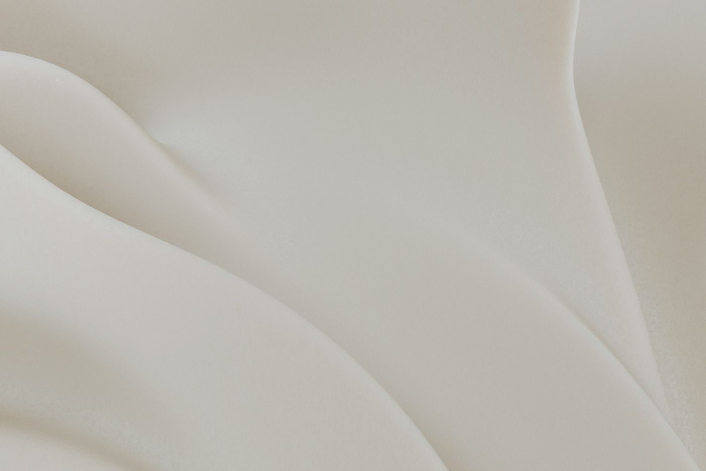 Soft folds of white cream texture
